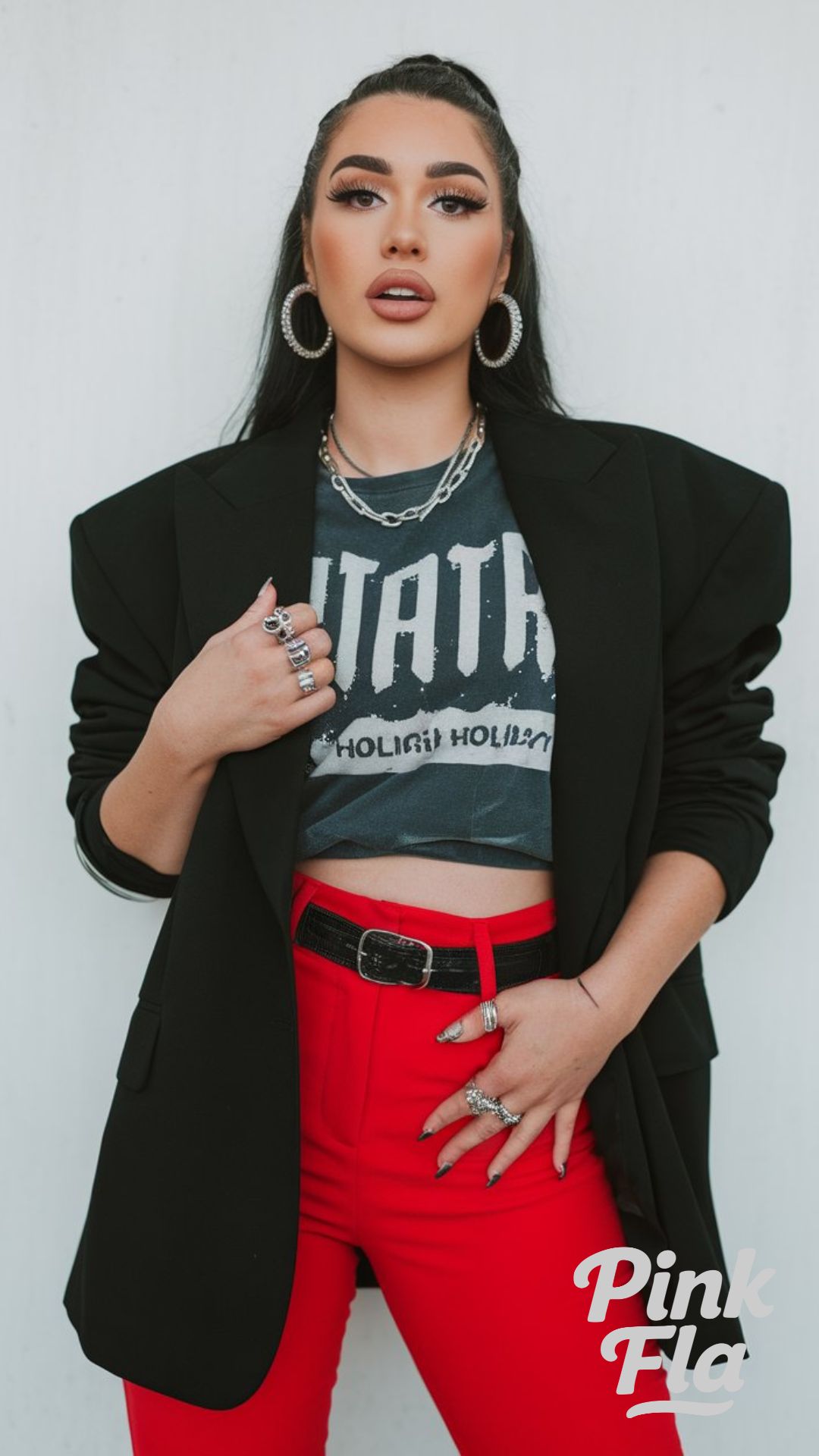 Edgy Holiday Glam With a Modern Twist - Christmas Outfits with Red Pants