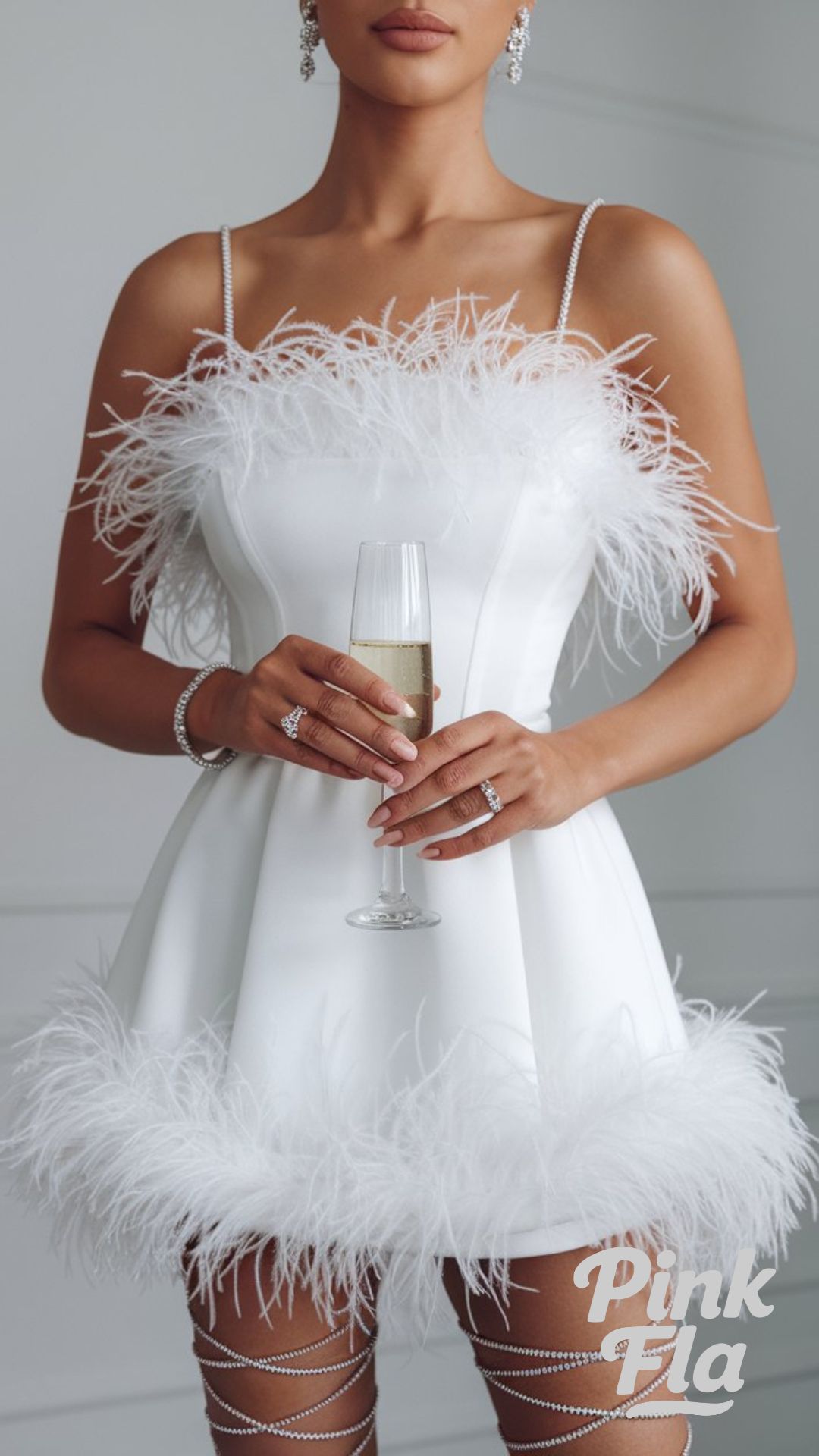 Feather-Trimmed Mini Dress for a Glamorous Night - New Year's Eve Outfit